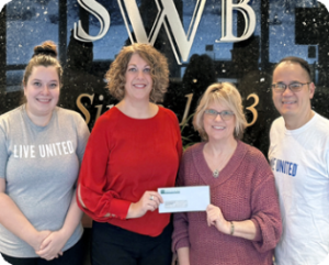 WSB donation photo to the United Way.